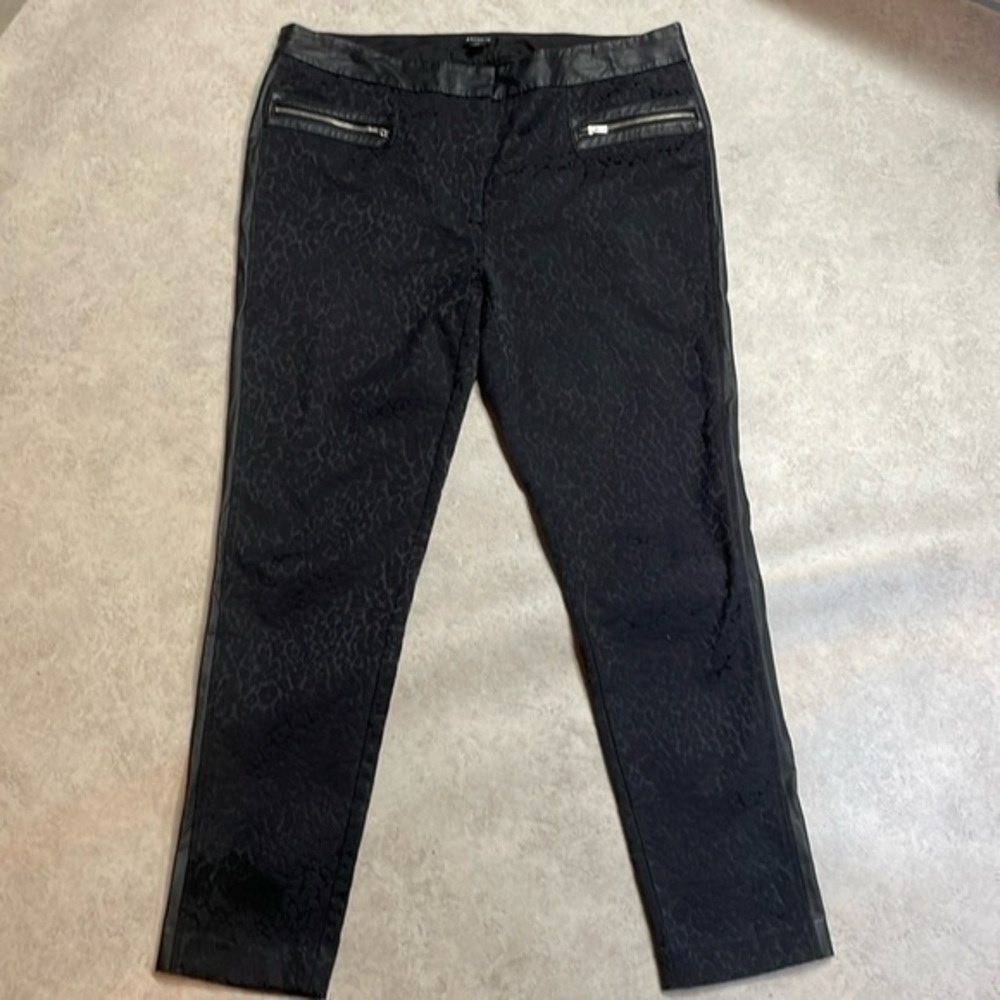 I love Ronson women’s black on black pants trousers faux leather trim. Size 16